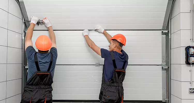 Garage Door Bottom Panel Repair in Hallandale Beach, FL
